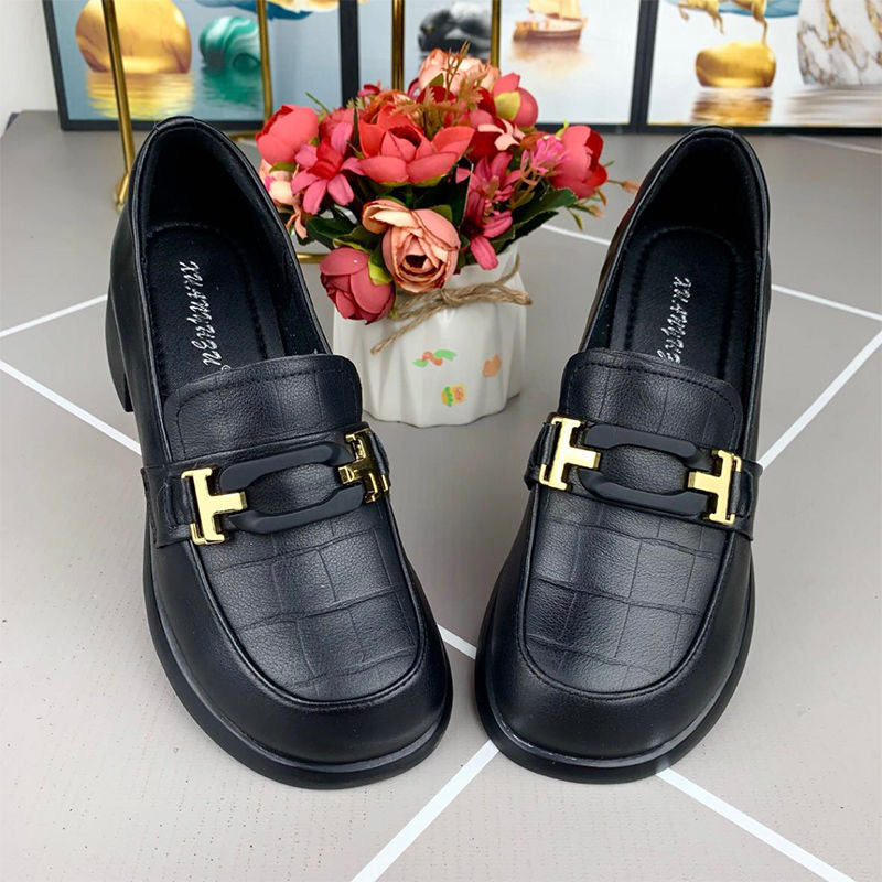 Zapatos de piel con etiqueta T